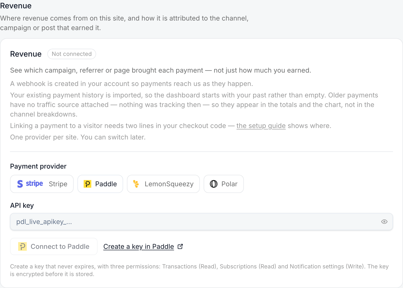 The Revenue card with Paddle chosen: an API key field, Connect to Paddle, the Create a key in Paddle link and the three permissions the key needs